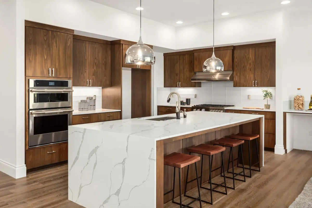 Modern kitchen remodel in Oakville with custom walnut cabinetry