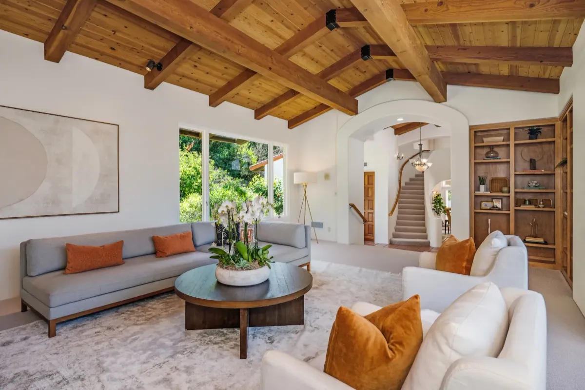 Rustic-modern family room renovation in Hamilton featuring vaulted ceiling